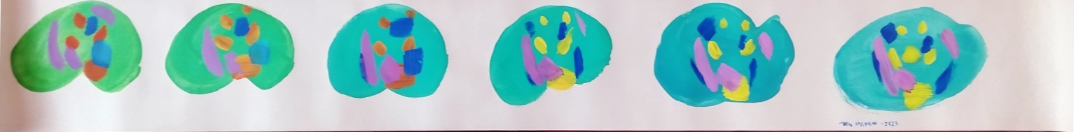 A photo of a roll of wallpaper. The wallpaper roll is opened and the inside has been painted with green and blue blobs. Inside the blobs are abstract and colorful shapes.